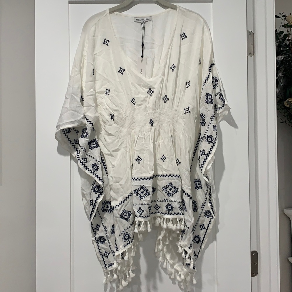 heartloom poncho style embroidered tassel top